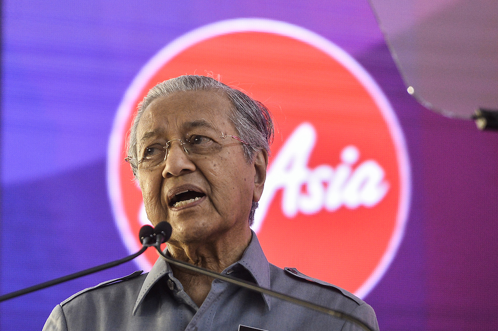 Prime Minister Tun Dr Mahathir Mohamad addresses staff during a visit to AirAsia RedQ in Sepang August 16, 2019. u00e2u20acu201d Picture by Miera Zulyana