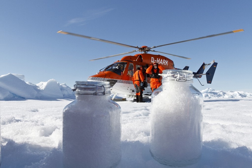 Scientists from the institute use the helicopter from the icebreaker research vessel Polarstern to collect snow samples in the Arctic August 4, 2017. u00e2u20acu201d Picture courtesy of the Alfred Wegener Institute via AFP