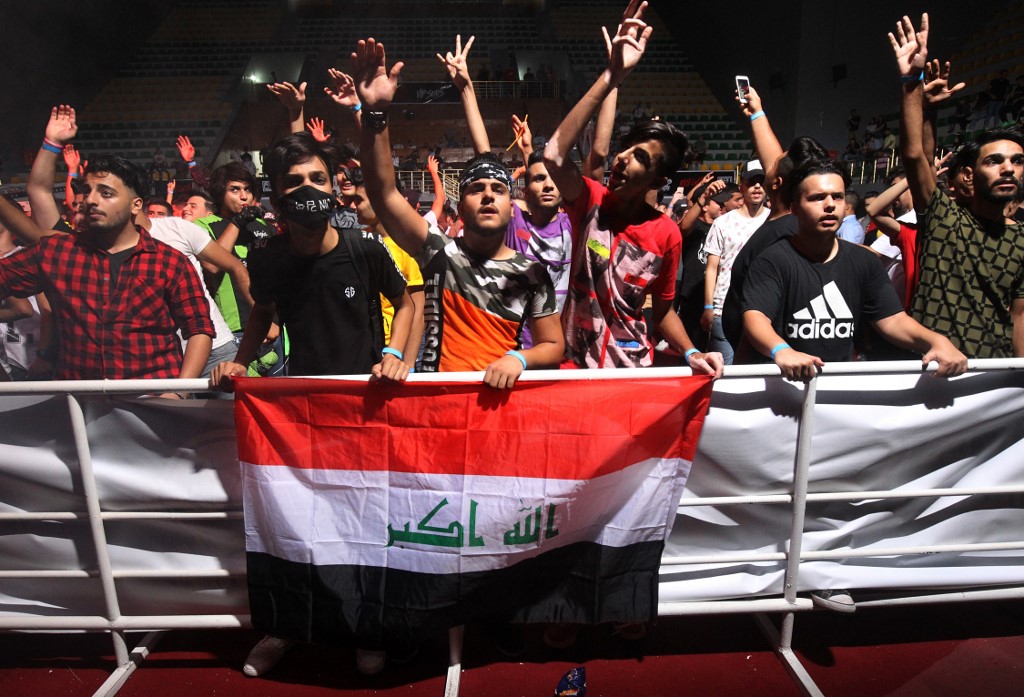 Youths attend an electronic dance music event, during the annual Baghdad Summer Festival at the People's Hall in the Iraqi capital on August 16, 2019. u00e2u20acu201d AFP picnn