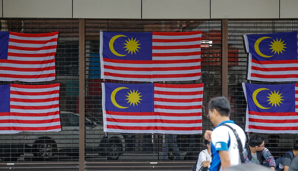 Malaysia flags are seen at the side of a building at Lebuh Queen in George Town August 21, 2019. u00e2u20acu201d Picture by Sayuti Zainudin 