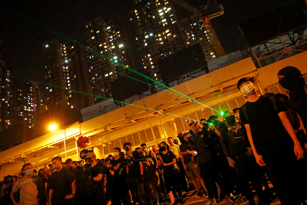 People protest during a silent sit-in gathering at Yuen Long MTR station, the scene of an attack by suspected triad gang members a month ago, in Yuen Long, New Territories, Hong Kong August 21, 2019. u00e2u20acu201d Reuters pic
