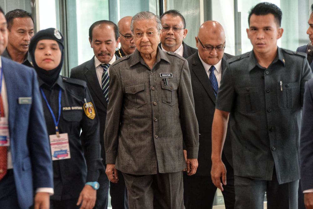 Prime Minister Tun Dr Mahathir Mohamad arrives for a meeting with government officers in Putrajaya August 22, 2019. u00e2u20acu201d Picture by Shafwan Zaidon