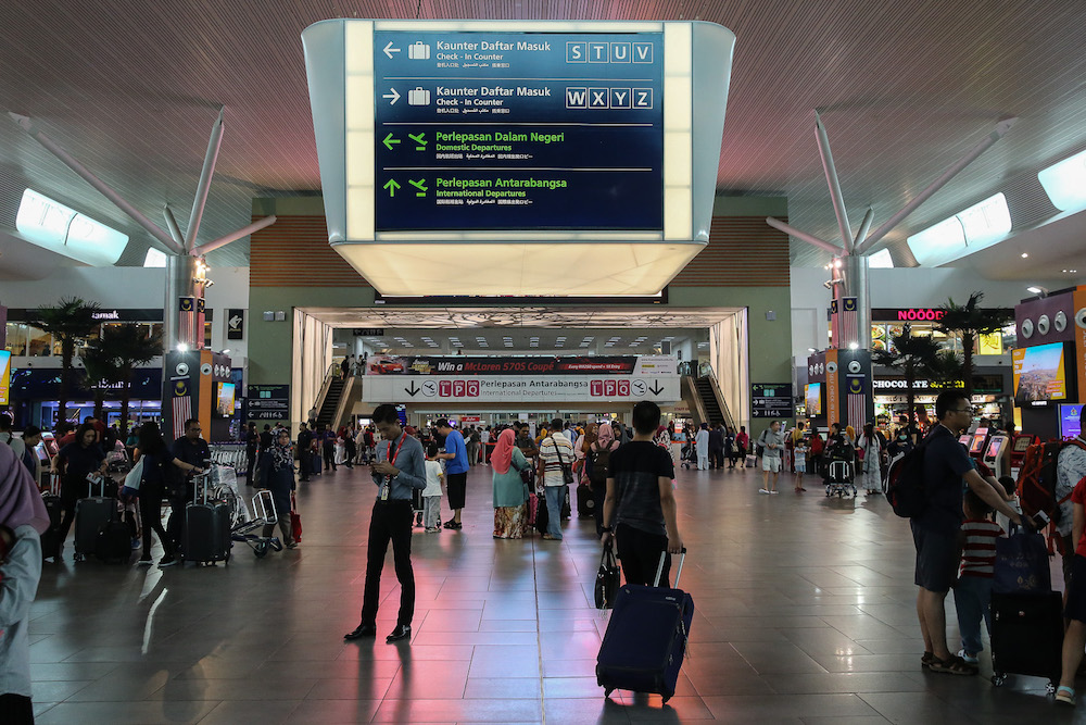 Passengers are seen at KLIA2 in Sepang August 22, 2019, during a systems outage. u00e2u20acu201d Picture by Yusof Mat Isa