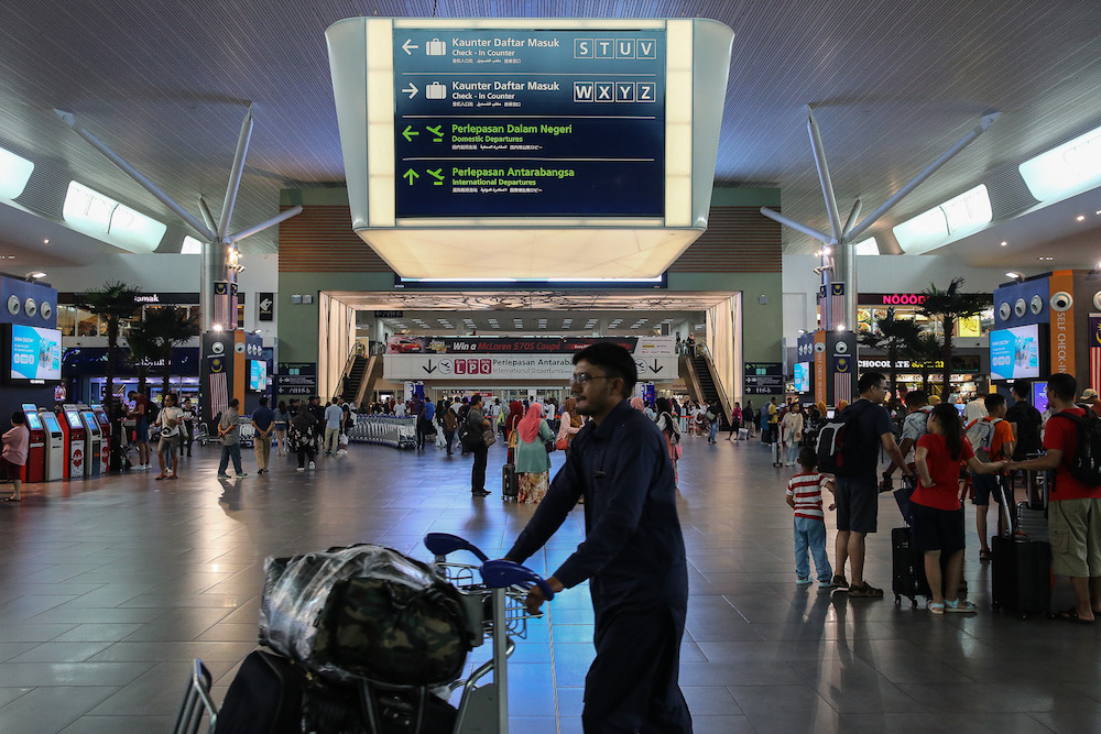 Passengers are seen at KLIA2 in Sepang August 22, 2019, during a systems outage. u00e2u20acu201d Picture by Yusof Mat Isa