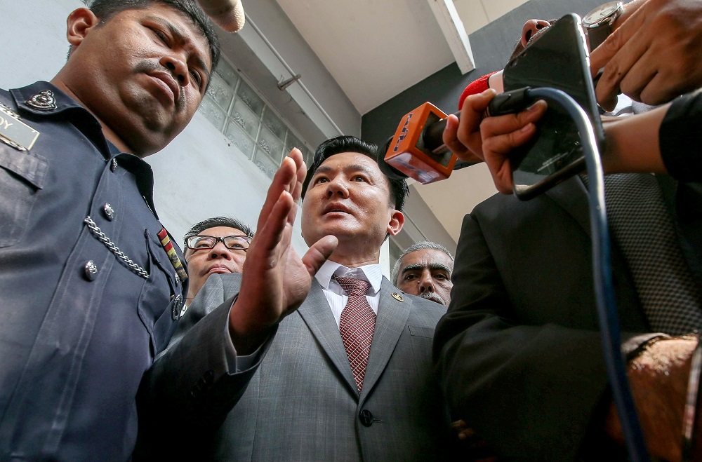 Perak state executive councillor Paul Yong speaks to reporters at the Sessions Court in Ipoh August 23, 2019. u00e2u20acu201d Picture by Farhan Najib