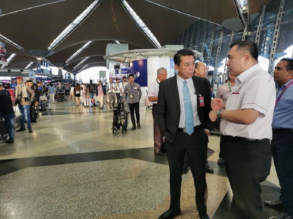 Transport Minister Anthony Loke (right) and the ministry's secretary-general Datuk Mohd Khairul Adib Abdul Rahman during their visit to the Kuala Lumpur International Airport in Sepang August 23, 2019. — Picture via Facebook/Anthony Loke Siew Fook