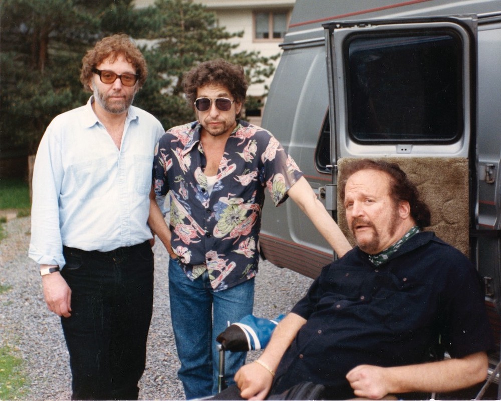 In this handout photo received by AFP on August 22, 2019, Bob Dylan (C) poses for a photo at his fiftieth birthday in 1991, with friends Louie Kemp (L) and Larry (last name unknown). u00e2u20acu201d AFP picnn