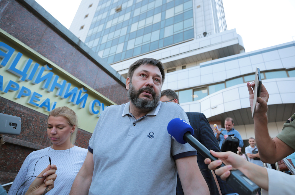 Kirill Vyshinsky, director of the Ukrainian office of the Russian state news agency RIA Novosti, talks to the media as he leaves a court building after a court ordered his release on bail, in Kiev August 28, 2019. u00e2u20acu201d Reuters pic
