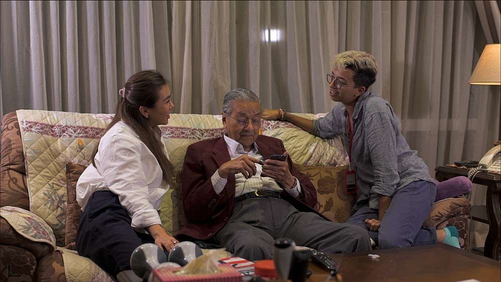 Dian Lee (left), Prime Minister Tun Dr Mahathir Mohamad and Ineza Roussille during the filming. — Picture courtesy of ‘M for Malaysia’