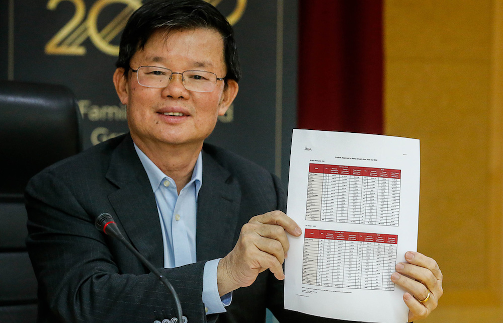 Penang Chief Minister Chow Kon Yeow shows the list of projects approved by the state government during a press conference in George Town August 29, 2019. u00e2u20acu201d Picture by Sayuti Zainudin