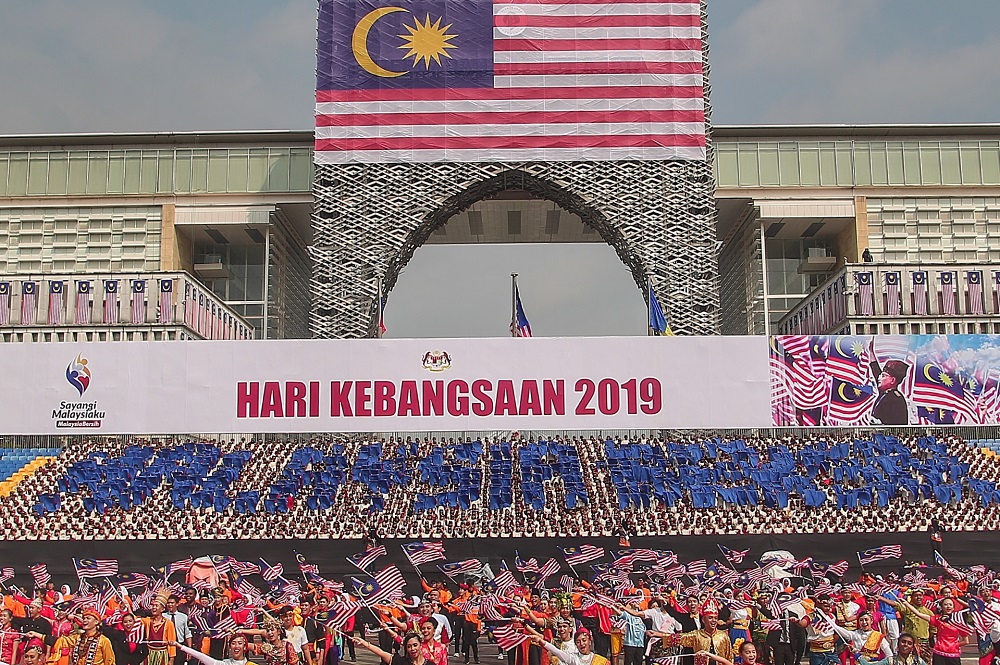 Students from various schools in Selangor take part in the human graphics formation during the National Day Parade at Putrajaya August 31,2019. — Pictures by Ahmad Zamzahuri