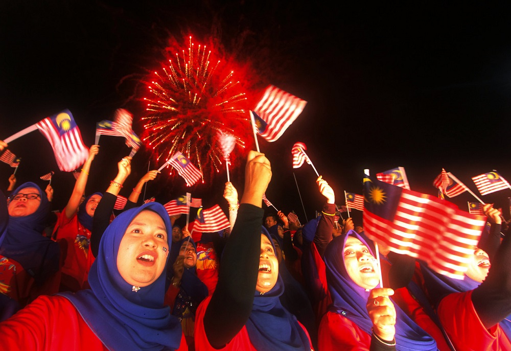 Choir members sing during a Merdeka celebration programme in Kangar August 31, 2019. — Bernama pic