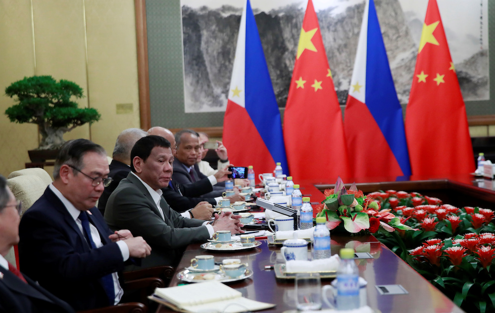 Philippine President Rodrigo Duterte speaks to Chinese President Xi Jinping (not pictured) during their meeting at the Diaoyutai State Guesthouse in Beijing August 29, 2019. u00e2u20acu201d How Hwee Young/Pool handout via Reuters