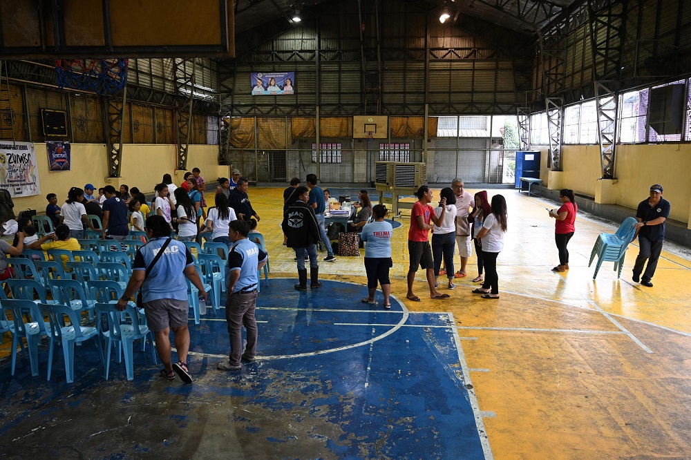 In this photo taken on August 24, 2019, village health workers hold a vaccination drive for children at an indoor basketball court in Manila. u00e2u20acu201d AFP pic           
