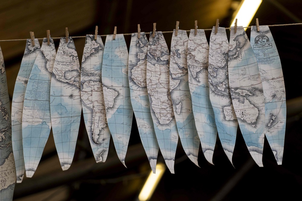 Hand-painted cartography on oval shaped strips called ‘gores’ dry at the Bellerby and Co Globemakers’ workshop and headquarters in Stoke Newington in north London July 19, 2019. — AFP pic