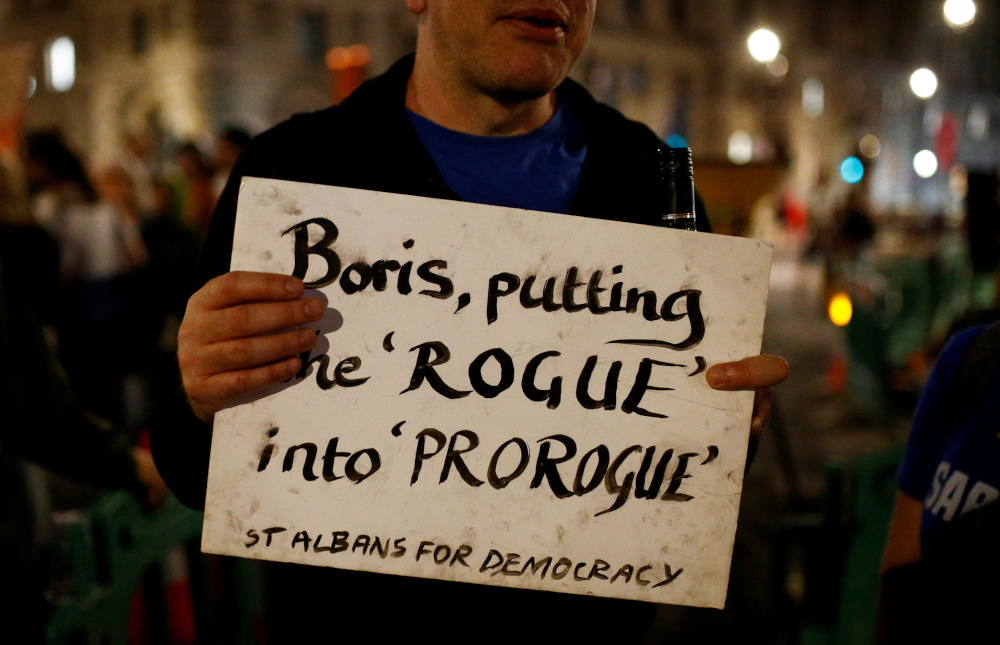 An anti-Brexit protestor holds placard, outside the Houses of Parliament in London, Britain August 28, 2019. u00e2u20acu201d Reuters pic 