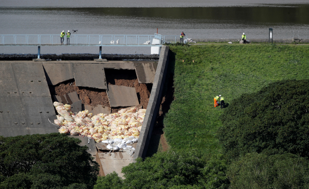 Workers use a drone to observe the damaged section of the dam in Whaley Bridge, Britain August 2, 2019. u00e2u20acu201d Reuters pic 