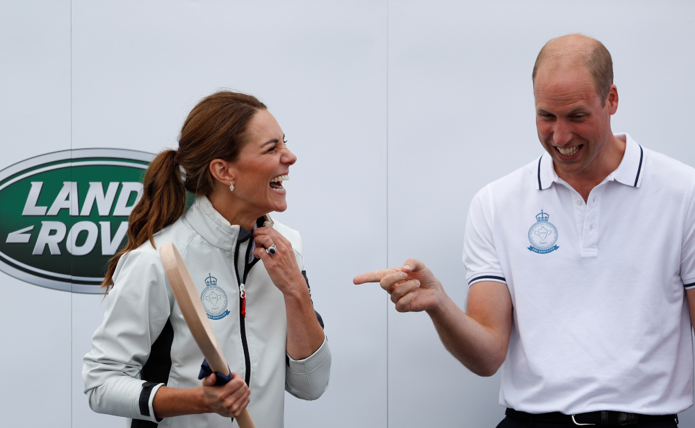 Catherine Duchess of Cambridge reacts, next to Britainu00e2u20acu2122s Prince William, as she holds a wooden spoon received during the Kingu00e2u20acu2122s Cup Regatta at a presentation ceremony in Isle of Wight, Britain August 8, 2019. u00e2u20acu201d Reuters pic 