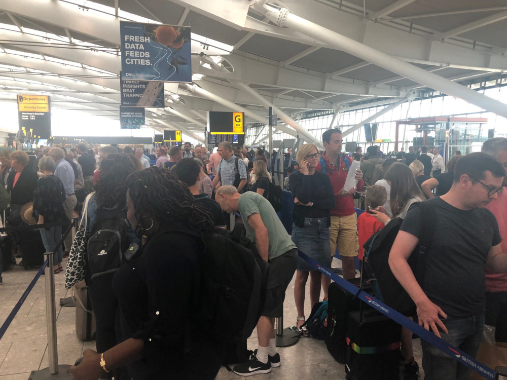 Passengers wait in long queues at Heathrow Airport as IT problems caused flight delays in London, Britain, August 7, 2019 in this picture obtained from social media. u00e2u20acu201d Paul Trickett pic via Reuters 
