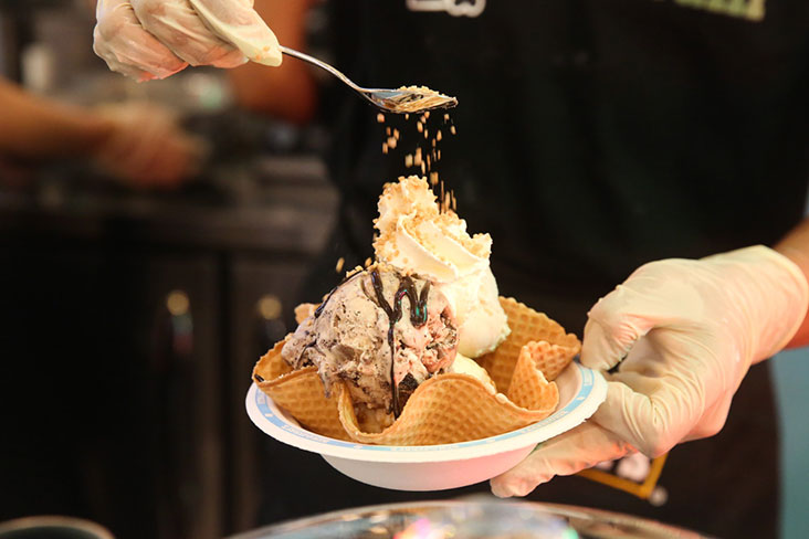 A variety of drinks can be ordered at the scoop shop (from left to right): Berry Splash, Sweet Cream & Cookies DIY Shake, Mango Lemonade and Lemon Splash.