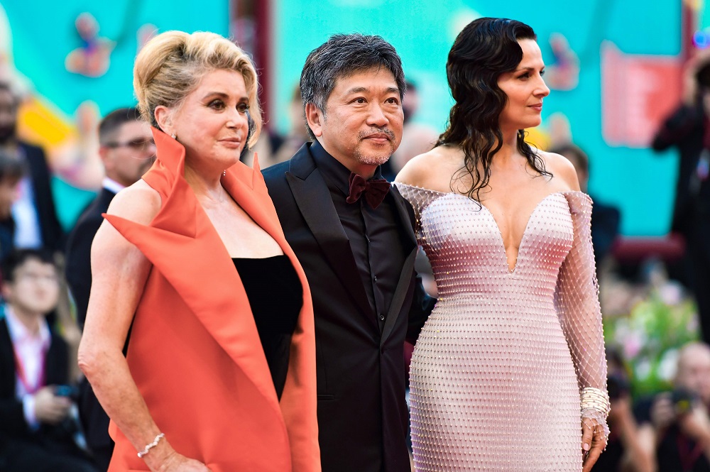 From left: French actress Catherine Deneuve, Japanese director Hirokazu Kore-eda and French actress Juliette Binoche arrive for u00e2u20acu02dcThe Truthu00e2u20acu2122 presented in competition at the 76th Venice Film Festival August 28, 2019. u00e2u20acu201d AFP pic        