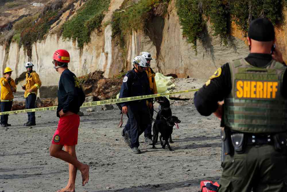 Emergency responders attend to a cliff collapse at a beach in Encinitas, California August 2, 2019. u00e2u20acu2022 Reuters pic