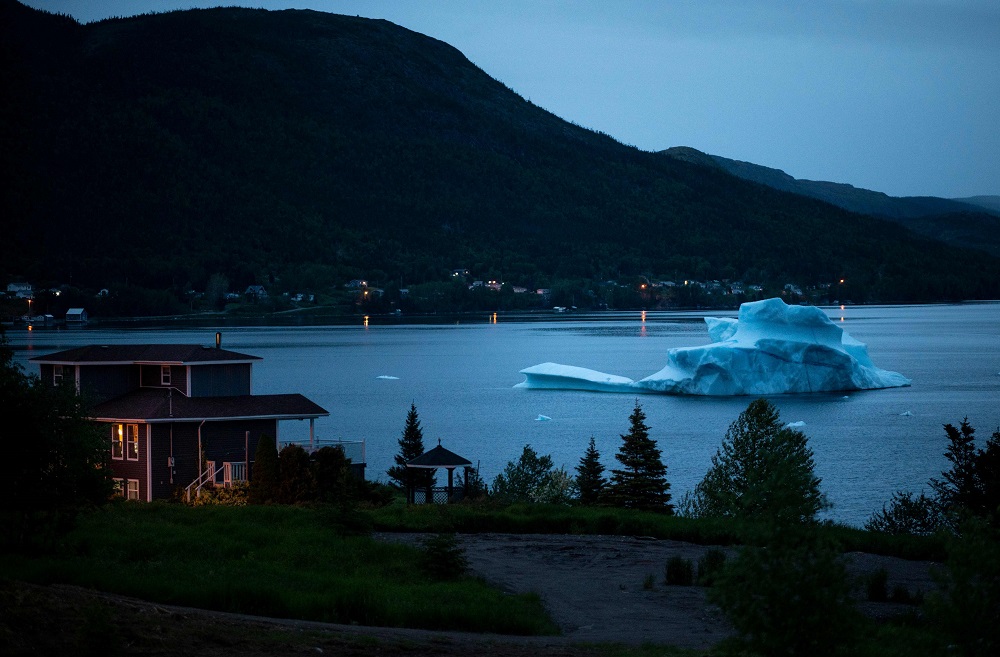 An iceberg at the seashore of King’s Point in Newfoundland, Canada July 4, 2019. — AFP pic
