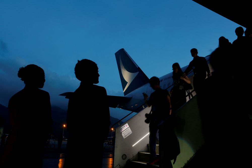 Guests descend from a Cathay Pacific Airways Airbus A350 after a tour of the aircraft cabin at Hong Kong Airport May 30, 2016. u00e2u20acu201d Reuters pic