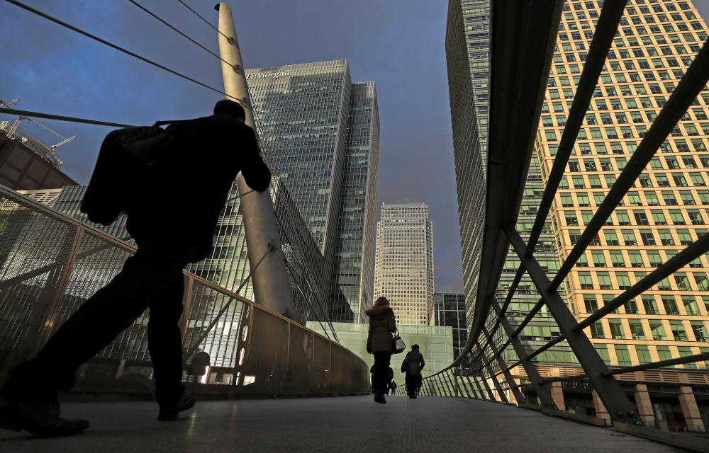 People walk through the Canary Wharf financial district of London, Britain, December 7, 2018. u00e2u20acu201d Reuters pic 