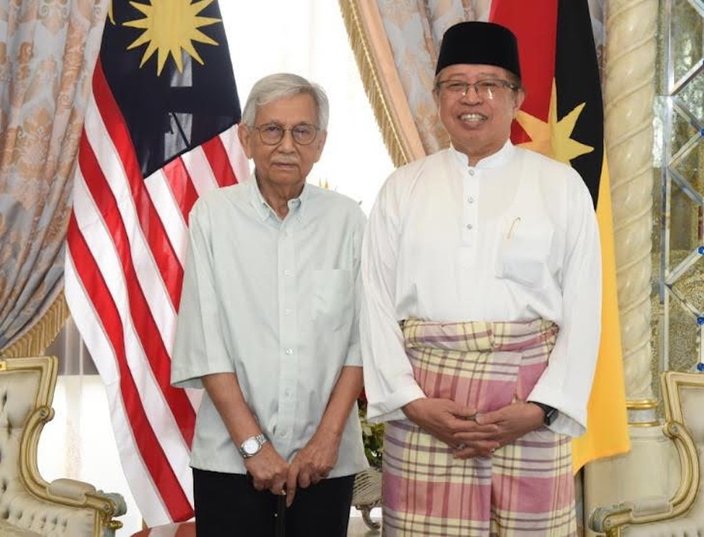Tun Daim Zainuddin and Chief Minister Datuk Patinggi Abang Johari Openg pose for photographs before the start of their meeting in Kuching August 3, 2019. u00e2u20acu201d Picture courtesy of Sarawak Chief Ministeru00e2u20acu2122s Office