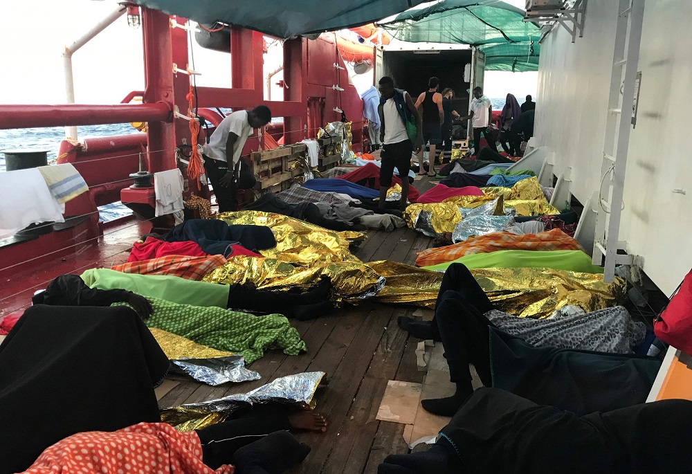Rescued migrants sleep on deck of the 'Ocean Viking' rescue ship, jointly operated by French NGOs SOS Mediterranee and Medecins sans Frontieres (MSF) on August 17, 2019, during a search-and-rescue operation in the Mediterranean Sea. u00e2u20acu201d AFP pic 