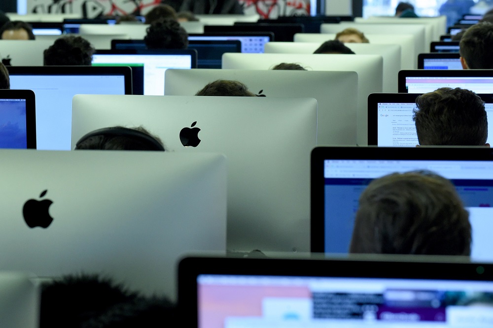 In this file photo taken on February 19, 2019, students work on computers at the u00e2u20acu02dcEcole 42u00e2u20acu2122 computer programming school in Paris. u00e2u20acu201d AFP pic  