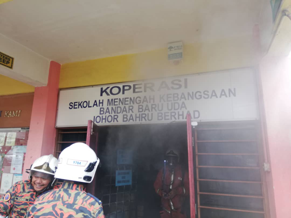 Five female students of Sekolah Menengah Kebangsaan (SMK) Bandar Baru Uda here were rushed the hospital after they suffered breathing difficulties during a fire which gutted the schoolu00e2u20acu2122s cooperative room in Johor August 26, 2019. u00e2u20acu201d Bernama pic