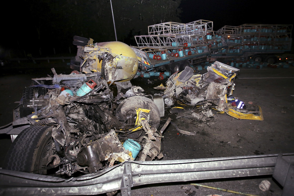 The aftermath of an accident involving two lorries carrying gas cylinders and two motorcycles at KM269.9 of the PLUS Expressway (north bound) from Bandar Ainsdale to Nilai August 26, 2019. u00e2u20acu201d Bernama pic