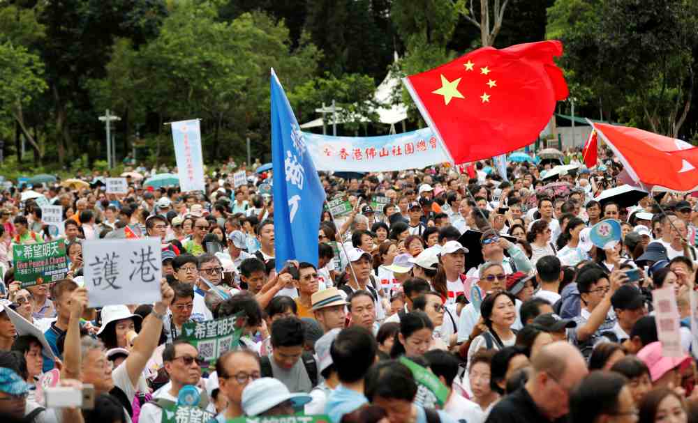 Pro-government supporters attend a rally to support the police and call for an end to violence in Hong Kong August 3, 2019. u00e2u20acu2022 Reuters pic