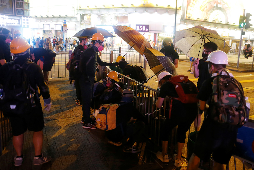 Anti-extradition bill protesters set up a roadblock at Tsim Sha Tsui neighborhood in Hong Kong, China, August 10, 2019. u00e2u20acu201d Reuters