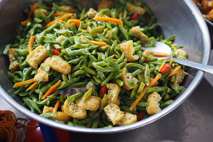 Some of the vegetables like the stir fried long beans look more at home in a Chinese economy rice stall