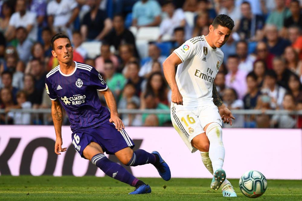 Valladolid midfielder Fede San Emeterio challenges Real Madrid midfielder James Rodriguez during the Spanish League football match between Real Madrid and Real Valladolid at the Santiago Bernabeu stadium in Madrid August 24, 2019. u00e2u20acu201d AFP pic 