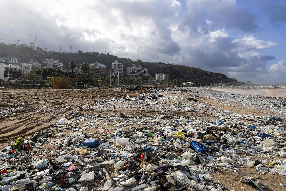 This file photo taken on January 23, 2018 shows a view of the beach of the coastal town of Zouk Mosbeh, north of Beirut, covered with garbage and waste that washed and piled along the shore after stormy weather. u00e2u20acu201d AFP pic  