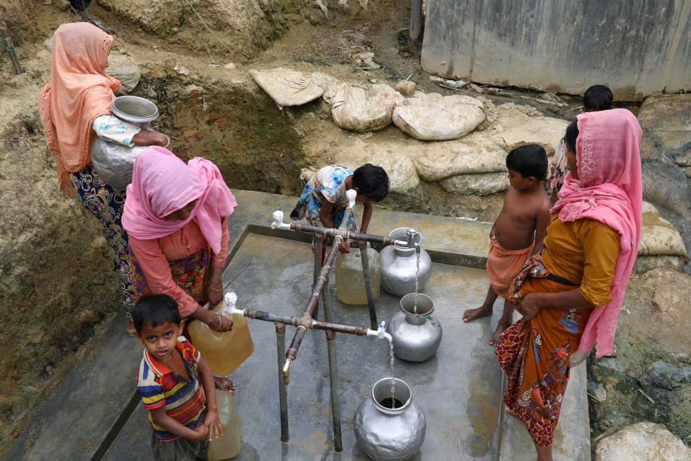 Rohingya refugees collect drinking water at the Shalbagan refugee camp in Teknaf, Bangladesh, March 5, 2019. u00e2u20acu201d Reuters pic 