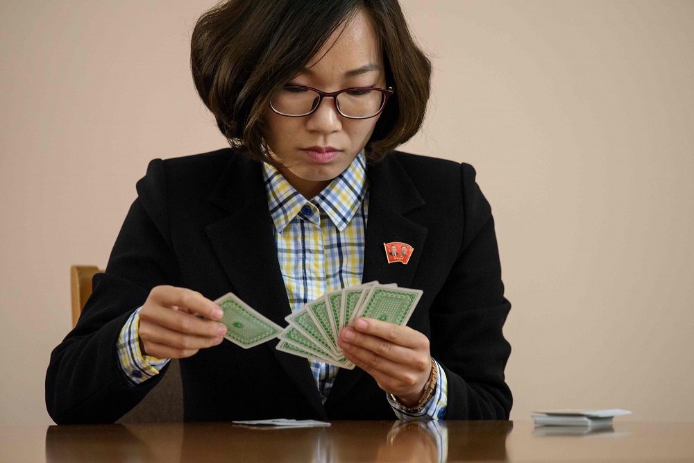 In a photo taken on April 17, 2019, memory competitor Pang Un Sim arranges a deck of cards to demonstrate her skills at the Kim Hyong Jik university of education in Pyongyang. u00e2u20acu201d AFP pic          