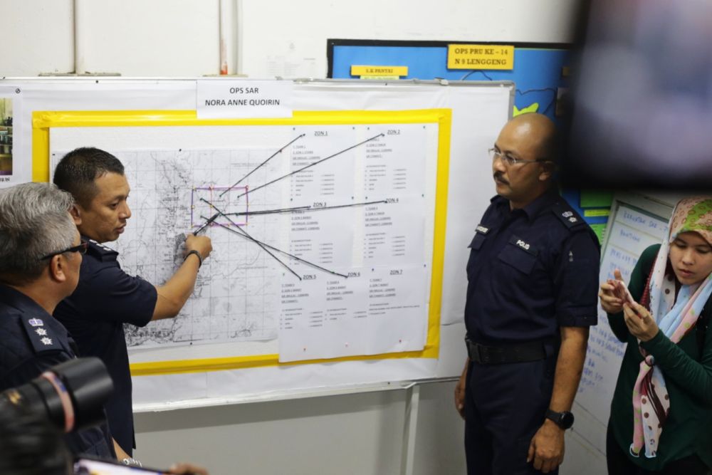Police personnel brief members of the press on search and rescue efforts for missing Irish teen Nora Anne Quoirin at the Pantai police station in Kuala Lumpur August 7, 2019. u00e2u20acu201d Picture by Ahmad Zamzahuri