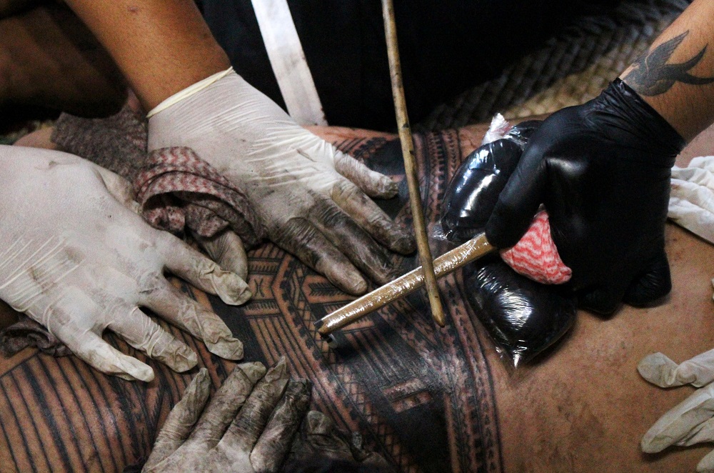 Oliver Fagalilo receives a traditional tattoo delivered by Samoan tattoo artist Li’aifva Imo Leni in Apia, Samoa July 15, 2019. — Reuters pic