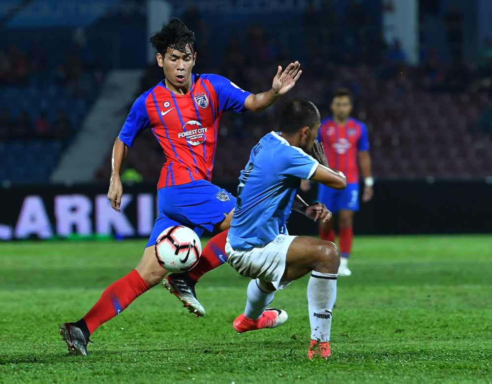JDT player Mohd Afiq Fazail in action against PJ CITY FC during the Group B Malaysia Cup at the Tan Sri Hassan Yunos Stadium in Larkin August 7, 2019. u00e2u20acu2022 Bernama pic