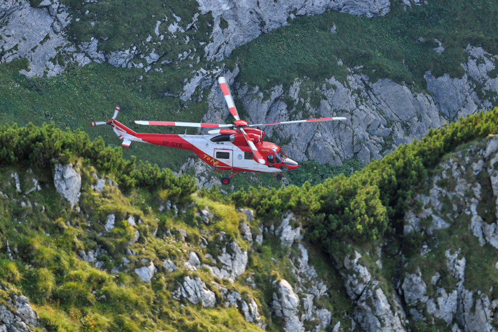 A mountain rescue team helicopter is pictured in Tatra mountains during a search mission to save two cavers trapped in a cavern near Zakopane, Poland August 19, 2019. u00e2u20acu201d Reuters pic 