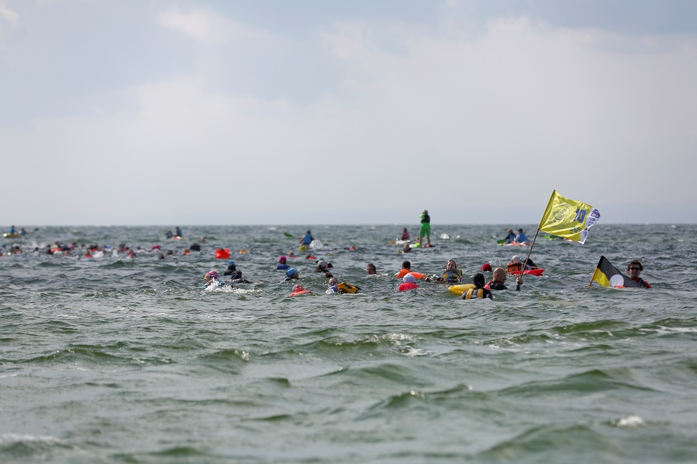 People take part in the annual event called ‘Marsz sledzia” (the Herring March), marching a 12km route through the shallow waters of the Baltic Sea from Kuznica on Hel Peninsula to the town of Rewa on the other side of Puck Bay, Poland August 17, 2019. — Reuters pic       
