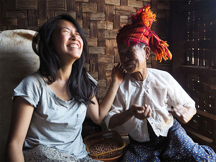 'Plates' founder Tan Dee May (left) and Dole, a peanut farmer from the Dongthu tribe, sharing a laugh.