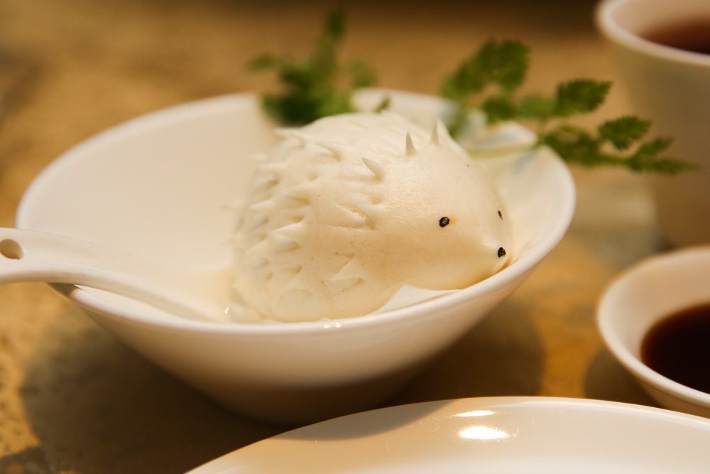The 10-piece dim sum platter includes a pair of fluffy white porcupine baos with reduced-sugar lotus paste. — Picture by Choo Choy May