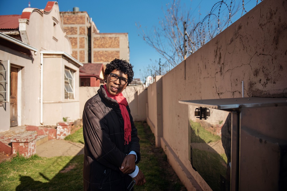 House manager Francinah Phago stands next to a so called babybox, a metal box built into the perimeter wall of the orphanage garden where mothers can place unwanted babies, at the Door of Hopes organisation in Hillbrow, on June 27, 2019. u00e2u20acu201d AFP pic      