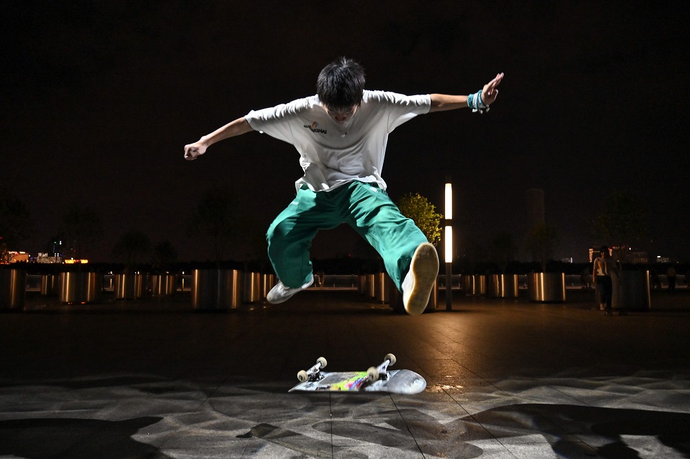 This photo taken on June 30, 2019 shows a boy practicing on a skateboard near the Shanghai Long Museum in Shanghai. u00e2u20acu201d AFP pic        